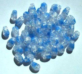 50 9mm Crystal & Light Sapphire Twisted Oval Crackle Beads