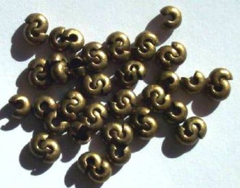 100 4mm Antique Gold Crimp Covers
