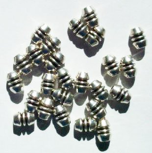 25 7x5mm Antique Silver Ridged Oval Metal Beads