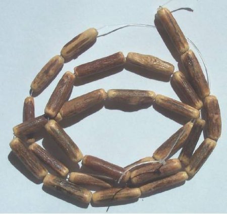 16 Inch Strand of 17x4mm Carved Sigid Tubes