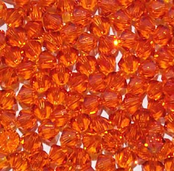 25 4mm Tangerine Swarovski Bicone Beads