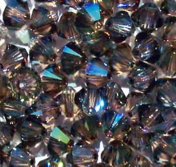 25 6mm Iridescent Green Swarovski Bicone Beads
