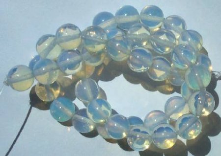 16 inch strand of 10mm Round Synthetic Fire Opal