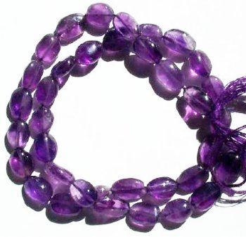 16 inch strand of 10x7mm Flat Oval Amethyst