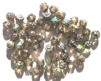50 6mm Cathedral Smoked Topaz AB with Antique Gold Coated Ends