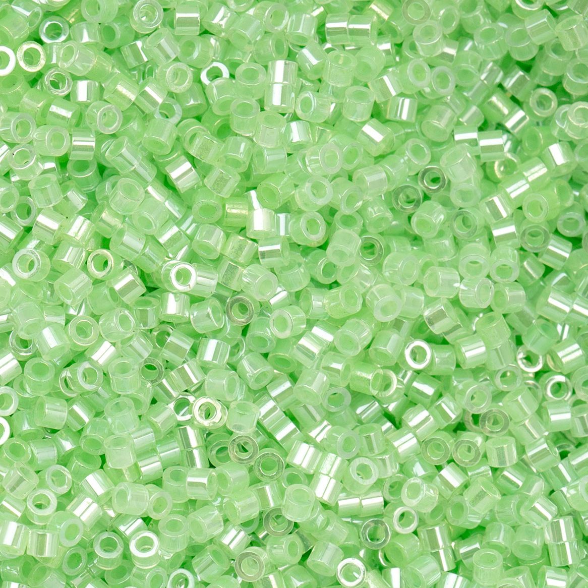 CY-1029 25 Grams of 11/0 Crystal Light Green Lined Ceylon Cylin Seed Beads