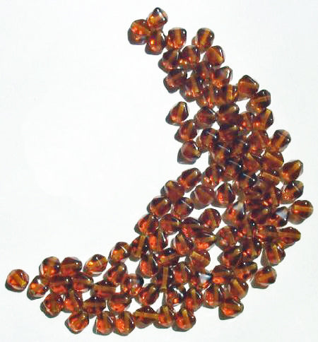 100 6mm Bicone Dark Topaz