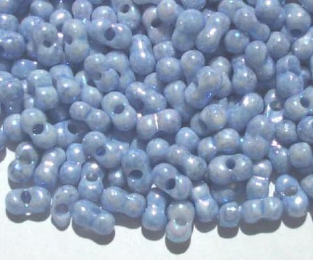 25 grams of 3x7mm Marble Blue Lustre Farfalle Seed Beads