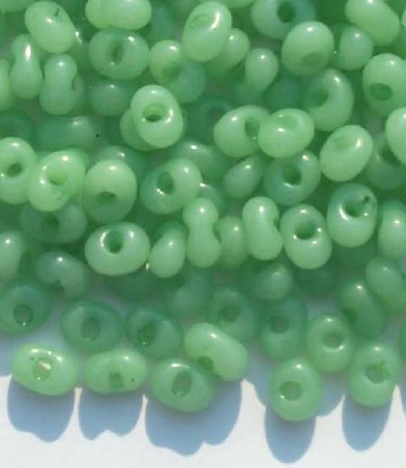 25 grams of 3x7mm Milky Green Farfalle Seed Beads