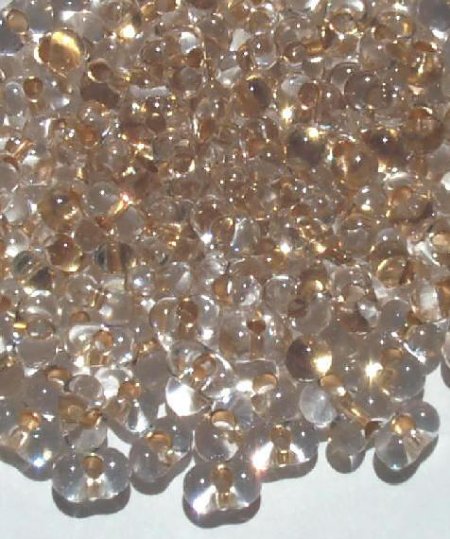 25 grams of 3x7mm Gold Lined Crystal Farfalle Seed Beads