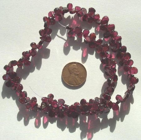 16 inch strand of 7x5mm Flat Tear Drop Garnet