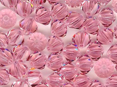 25 6mm Light Rose Swarovski Bicone Beads