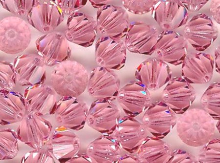 25 6mm Light Rose Swarovski Bicone Beads