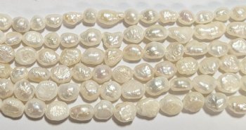 FWP 16inch Strand of 7x5mm Irregular Oval Off White Pearls