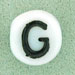 7x4mm White Glass Letter Bead - G