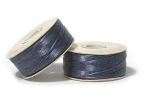 64 Yards of Dark Blue D Nymo Thread