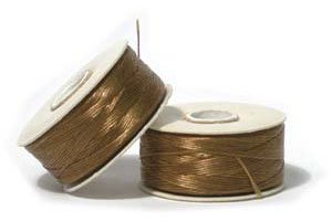 64 Yards of Golden D Nymo Thread