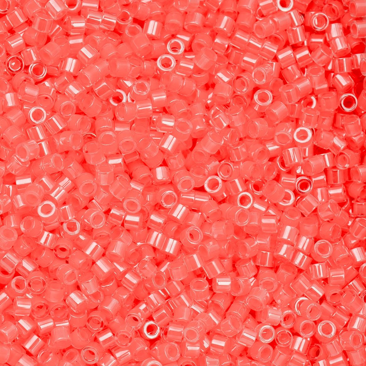 CY-1096 25 Grams of 11/0 Neon Coral Colorlined Cylin Seed Beads