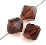 25 6mm Preciosa Light Burgundy Bicones