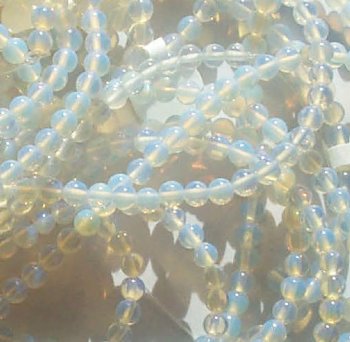 16 inch strand of 4mm Round Synthetic Fire Opal Beads