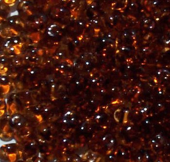 DUO510230 - 10 Grams Transparent Smoke Topaz 2.5x5mm Superduo Beads