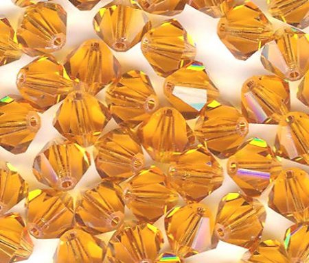 25 Topaz 6mm Bicone Swarovski
