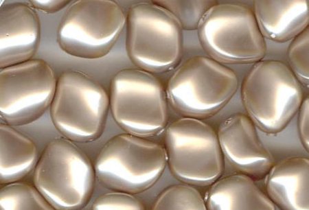 10 9x8mm Powder Almond Swarovski Twisted Pearl